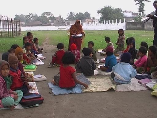 For want of infrastructure, children learn their lessons under an open sky in a graveyard in Bihar